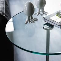 Detail of clear glass top of Gliss by Cattelan
