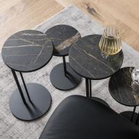 Sting side tables with Keramik stone tops in matt portoro marble