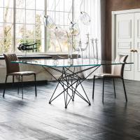 Gordon design table with metal intertwined structure; clear glass top.