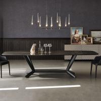 Planer is a ceramic marble dining table with elegant metal structure designed by Cattelan