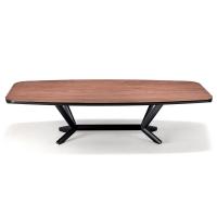 Planer is a shaped table by Cattelan here portrayed with top in canaletto walnut and rounded lower profile painted in graphite