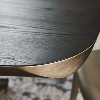 Detail of the shaped edge with brushed bronze painted profile