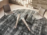Top view of the round glass table Ray by Cattelan with brushed bronze painted metal legs