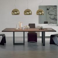 Sigma extending iron and wood table by Cattelan