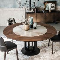 Soho by Cattelan is a round wooden table with ceramic stone insert set in the middle of the top, also available entirely made of canaletto walnut wood essence and burnt oak in various marmor-like finishes in keramik stone