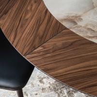 Detail of the top in canaletto walnut wood essence with insert in keramik stone