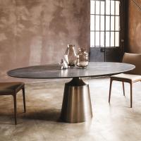 Yoda table by Cattelan with elliptic stone top 