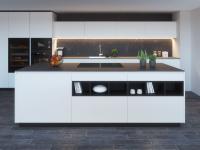Black and white kitchen with island with cook top