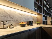 Detail of worktop and wall units with LED lights