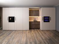 KLab 09 transformable and folding kitchen with doors concealing the cooking area 