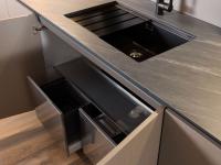 Stainless steel trash-bin integrated under the sink