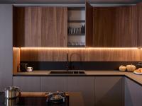 Modern kitchen with canaletto walnut veneer wall units