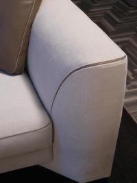 Detail of the armrest with sloping base connecting with the shallow seat and the profile with Trap machining