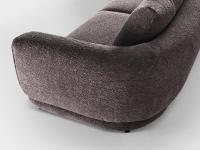 Focus on the Galway sofa with a curved backrest and low, hidden feet