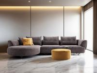Modern sofa with a curved peninsula Galway, and a matching round pouffe