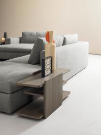 The matching side table that can be placed next to the sofa Holiday, at the end of the composition or between the seats