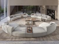 Circular seating area with three curved sofas