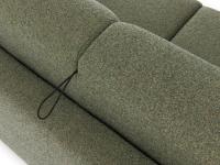 Detail of the practical pull cord that allows the bed to be opened without removing the cushions. With the sofa closed, the cord is hidden between the two back cushions