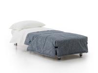 Derby armchair bed transformed into a single bed with integrated blanket