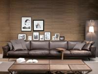 Linear sofa in generous dimensions Raymond, entirely upholstered in leather with a matching upholstered base