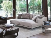 Chaise longue couple from the Raymond collection with a fabric cover and matching upholstered base