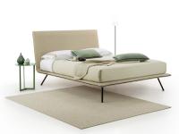 Twist sleek bed with high tilted feet