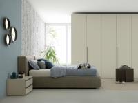 Side view of Nuvola soft upholstered bed