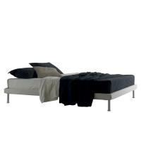 Headboardless high bed with thin bed frame and high round feet