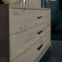 Detail of the drawers in rough cut oak and metal handles