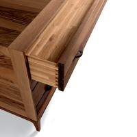 Detail of the solid wood drawers and veneer structure, natural walnut finish