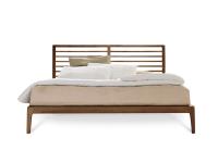 Seika wooden bed in natural walnut wood finish