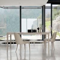 Daiki extending solid wood table matched with Eiko chairs from the same collection