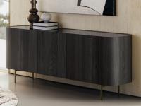 Modern sideboard with shell made from black Ash Tree wood, with a black painted glass top and metal bronze painted metal feet
