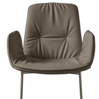 Frontal view of the chair with faux-leather piping and armrests. Leather cover and cantilever base in Titanium painted metal.