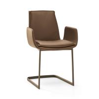 Dalila padded chair with cushion and armrests. Leather upholstery and metal cantilever base in the Titanium finish.