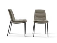The modern Dama upholstered seat in leather - with 4 metal legs