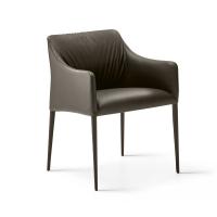 View of the Iside armchair with 4 legs from the front. Legs and seat upholstered in leather.