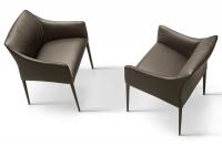 Two Iside armchairs from above. Legs and seat upholstered in leather.