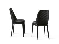 Michela upholstered dining chair with quilted backrest, with and without armrests. Leather upholstery and solid ash-wood legs in the Black finish.