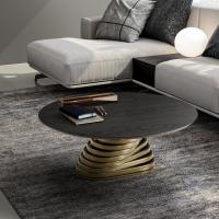 Vortex round coffee table with twisted base