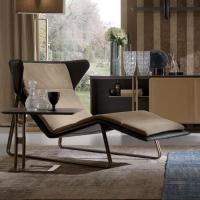 Romea is a hide leather chaise longue with metal base