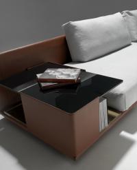 Victor luxury sofa with wide bookcase arm in the MAXI bookcase version that can be used as end table