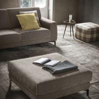 Chicago sofa complemented the ottoman from the same collection