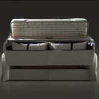 Practical storage compartment in the back of the sofa for storing pillows and bedding