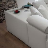 Bruce sofa - Detail of the square corner with the built-in audio system