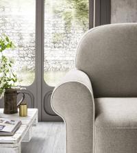 Curly smooth puffy upholstered shapes makes it apt for both classic and modern livings