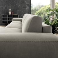 Lateral view of the sofa bed's cushions and arm