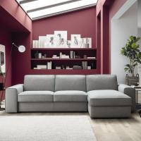 Emery sleeper sofa with fabric cover in a neutral shade to match it with every colour, even with vivid colour walls