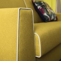 Detail of the modern and young llok of this sofa in a yellow verson