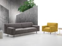 Aliseo comfortable sofa with wide, low armrests, also available as armchair and ottoman